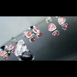 Pink heart diamond earrings.